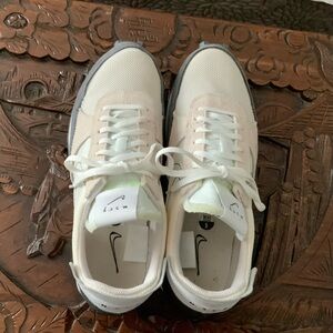 Nike Cream and White Athletic Shoes